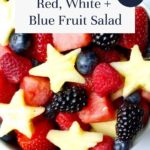 A bowl of star-shaped pineapple, blueberries, strawberries, blackberries, and watermelon makes a festive red white and blue fruit salad. A label reads Red, White + Blue Fruit Salad and a sticker says So easy!.