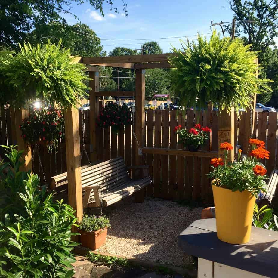 porch swings at noda company store's patio