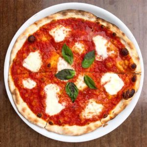 classic margarita pizza at pizzeria omaggio a pizza restaurant in charlotte