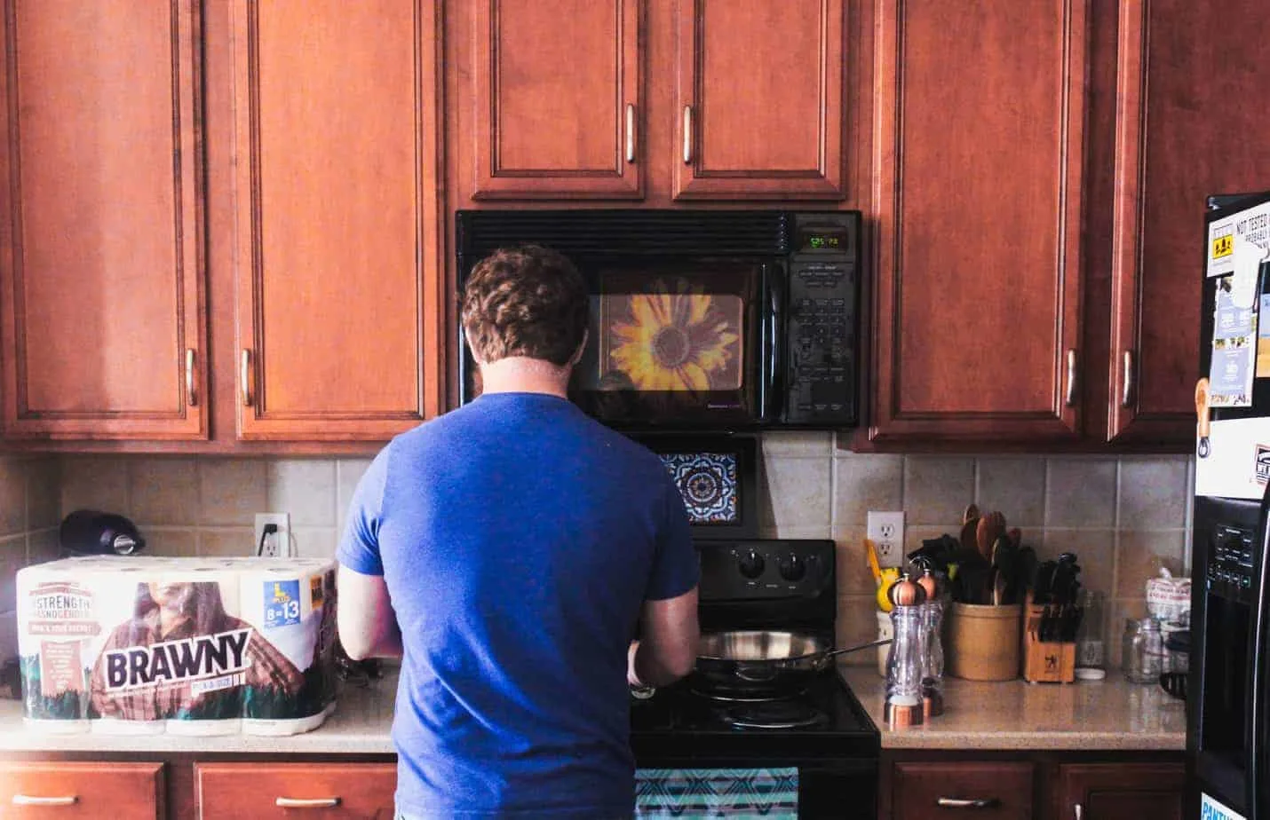 my husband making dinner after a long day of work as a public defender