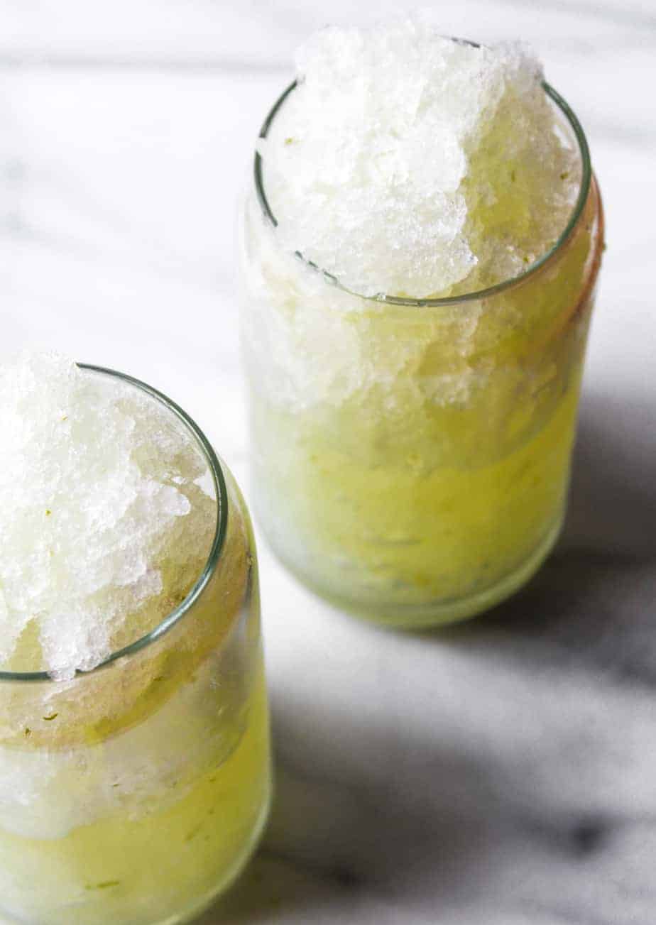 two glasses filled with lime granita