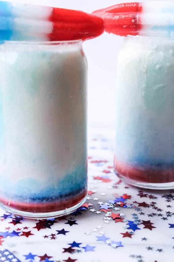 two popsicles melting into pina coladas