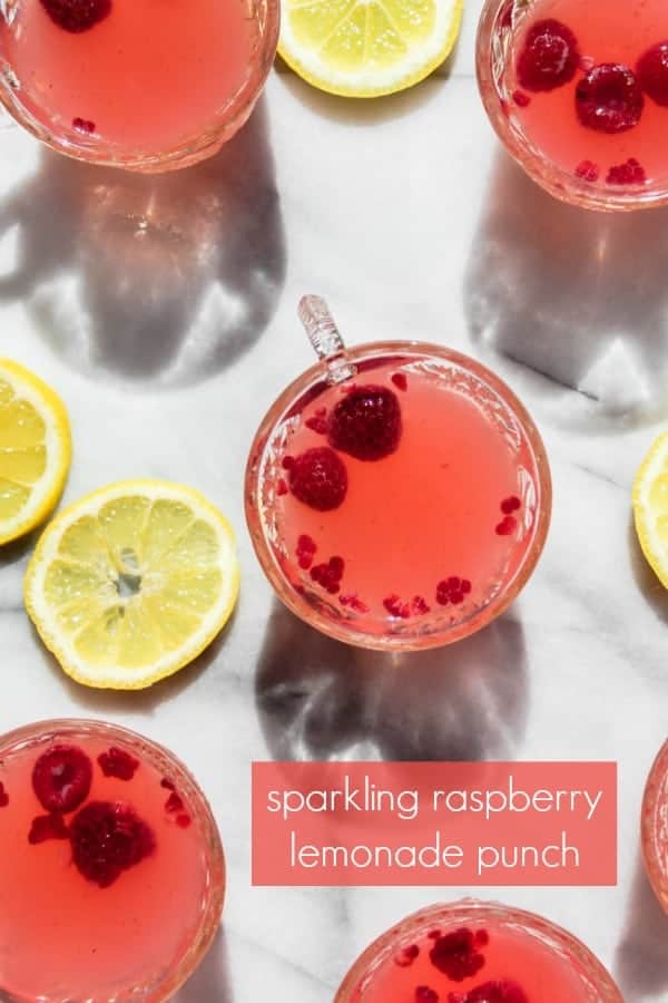 sparkling raspberry lemonade punch is an easy, refreshing drink for summertime celebrations! with both a mocktail and cocktail version, this drink recipe is perfect for a baby shower, bridal shower, party or as a refreshing drink on a hot summer afternoon.