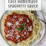 A plate of spaghetti topped with chunky red sauce, grated cheese, and basil, with a fork on the side. Text reads, Easy Homemade Spaghetti Sauce—the perfect recipe for busy nights. Logo for Off the Eaten Path at the bottom.