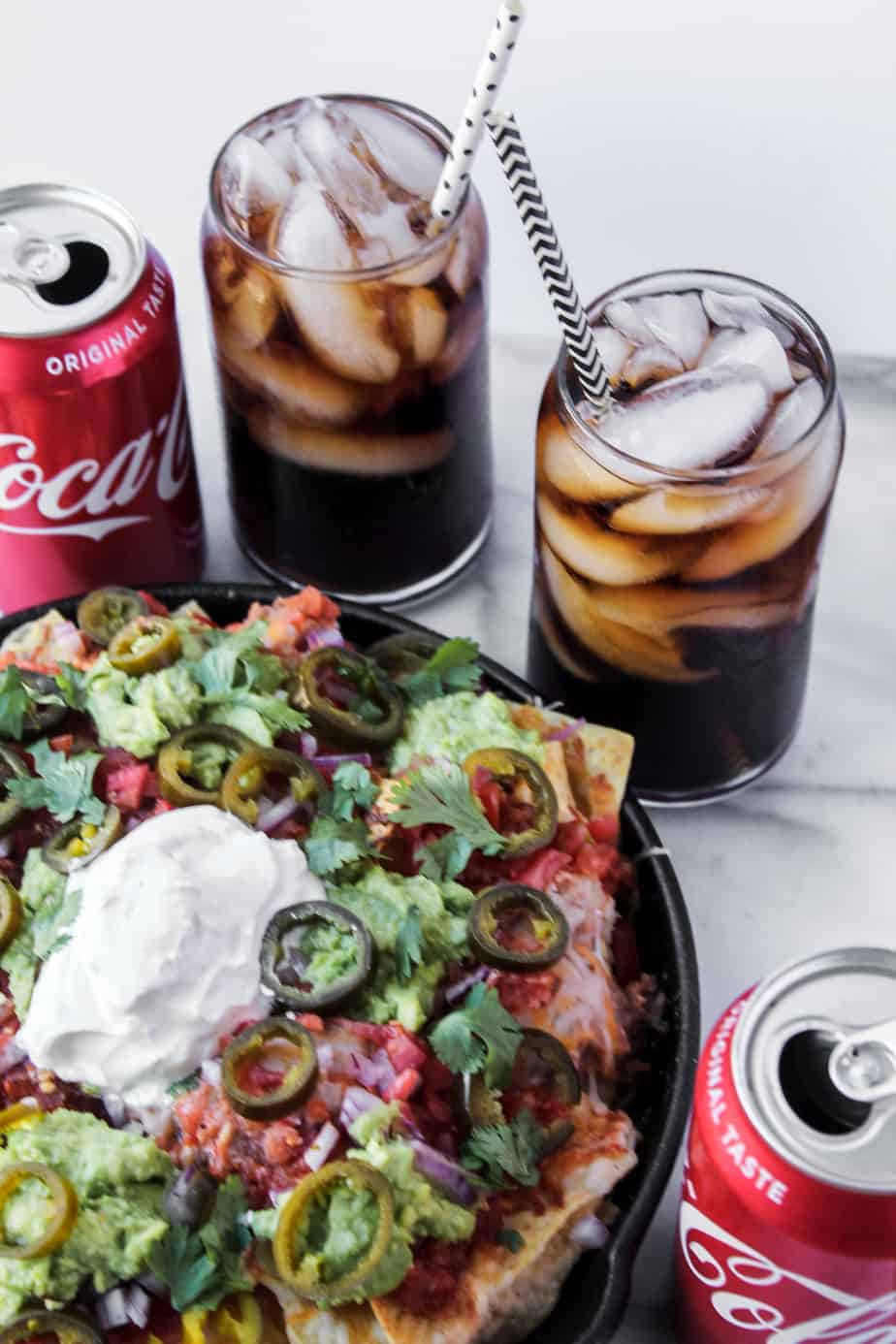 loaded grilled nachos with ice cold coca cola