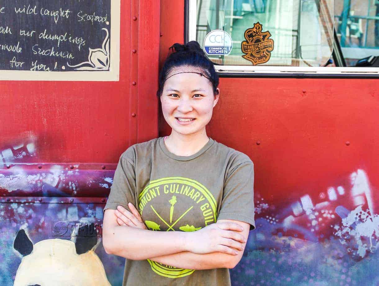 the dumpling lady qian zhang in front of her food truck