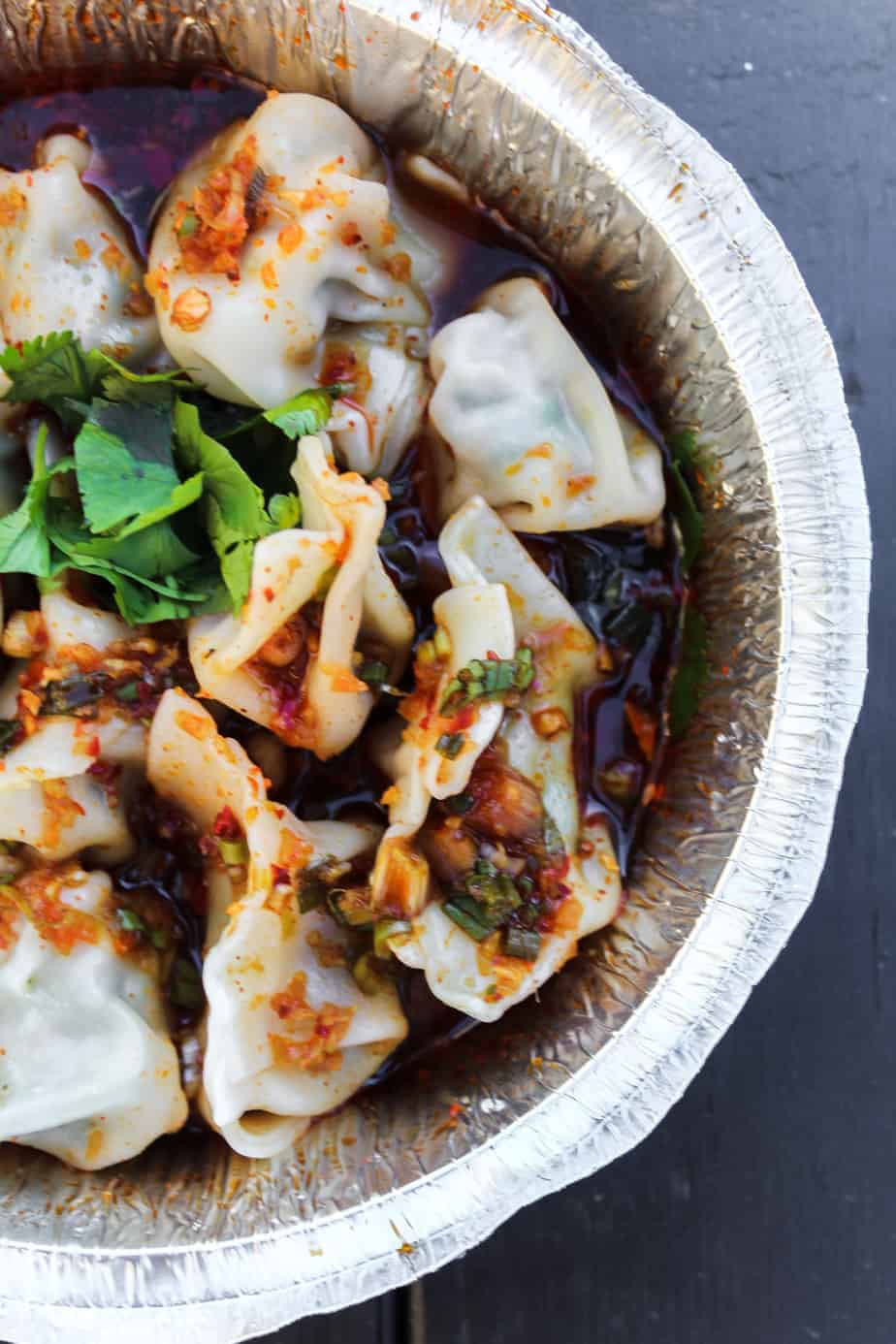 the dumpling lady close up of pork dumplings in a to go container