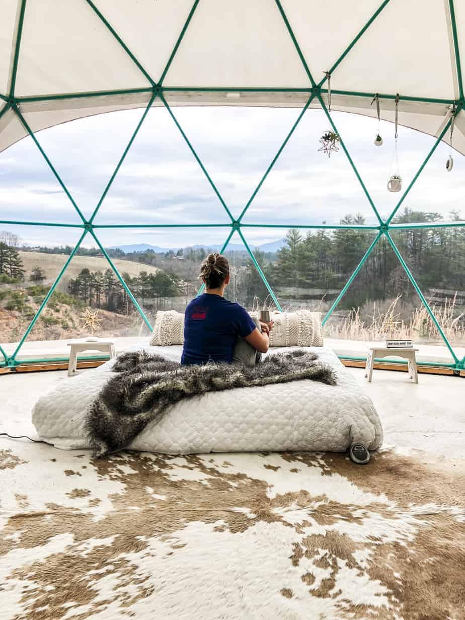 enjoying coffee in dome 2 at asheville glamping