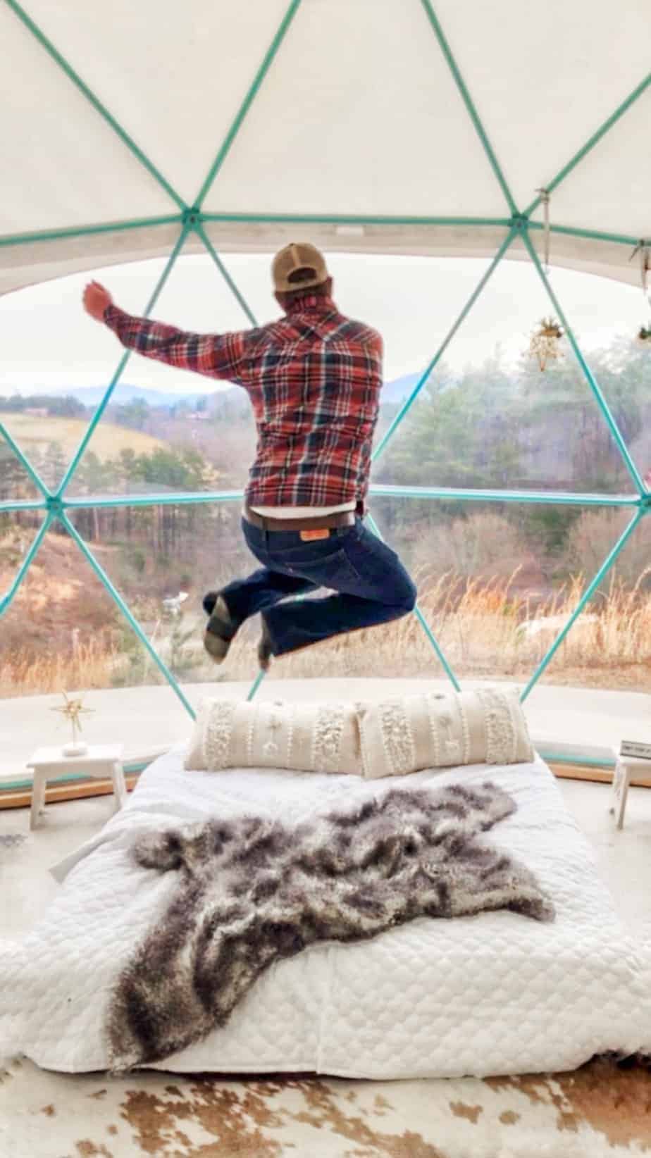 jumping for joy at asheville glamping