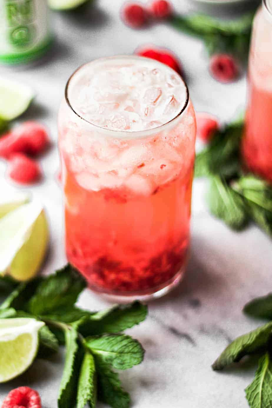 raspberry gin rickey cocktail with hard seltzer