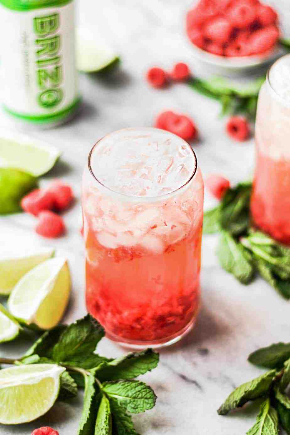 raspberry gin seltzer cocktail with limes raspberries and mint-2