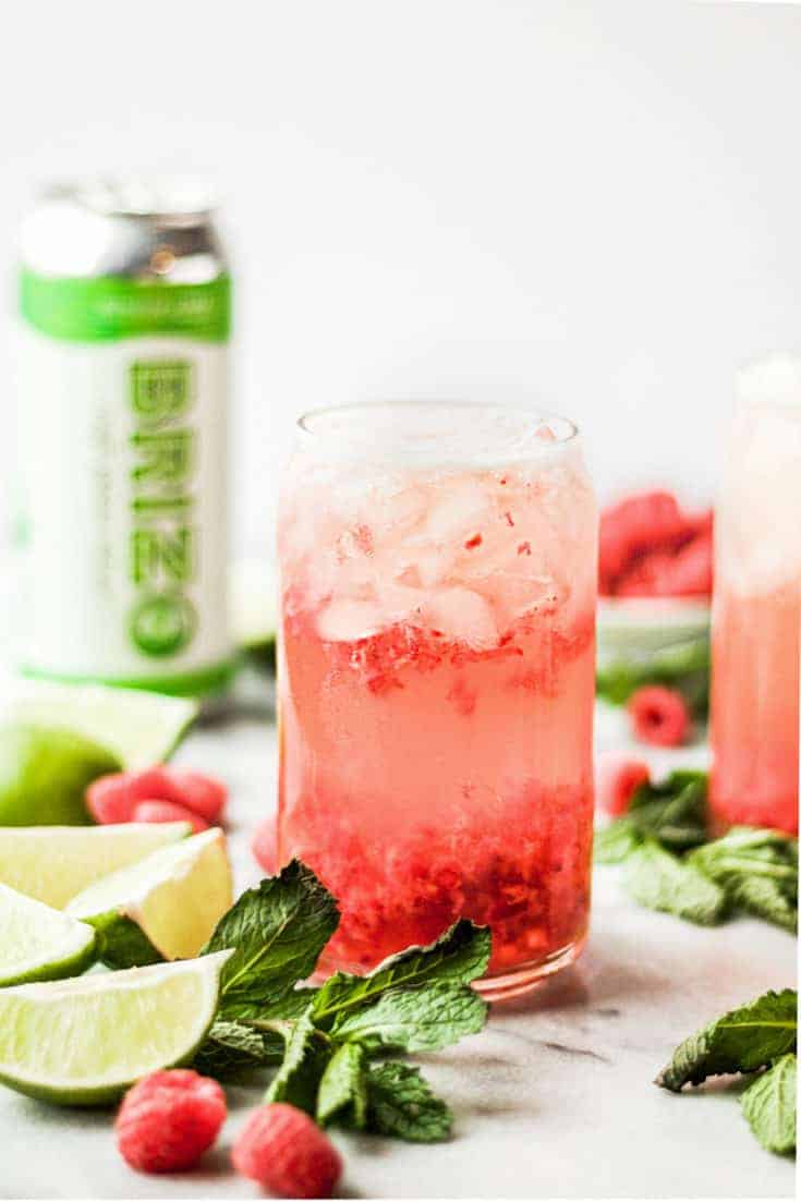 raspberry gin seltzer cocktail with noda brizo ginger lime can Off