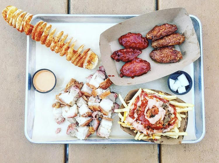 wings, kimchi fries, pork belly and potato on stick at seoul food meat company in charlotte nc