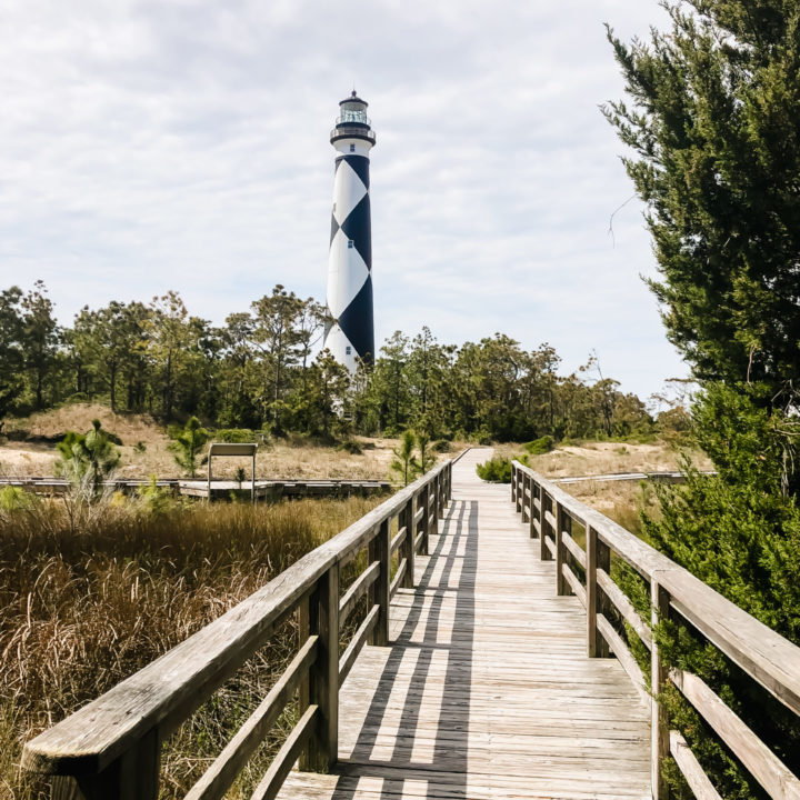 boardwalk leading up to the black and white cape lookout lighthouse