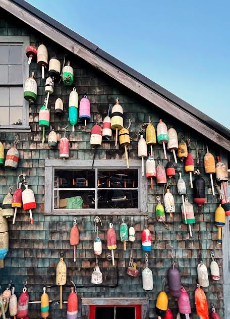 colorful buoys at a maine lobster pound