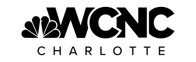 The WCNC Charlotte logo features the NBC peacock symbol on the left and bold black letters WCNC above the word CHARLOTTE in smaller, spaced-out letters.
