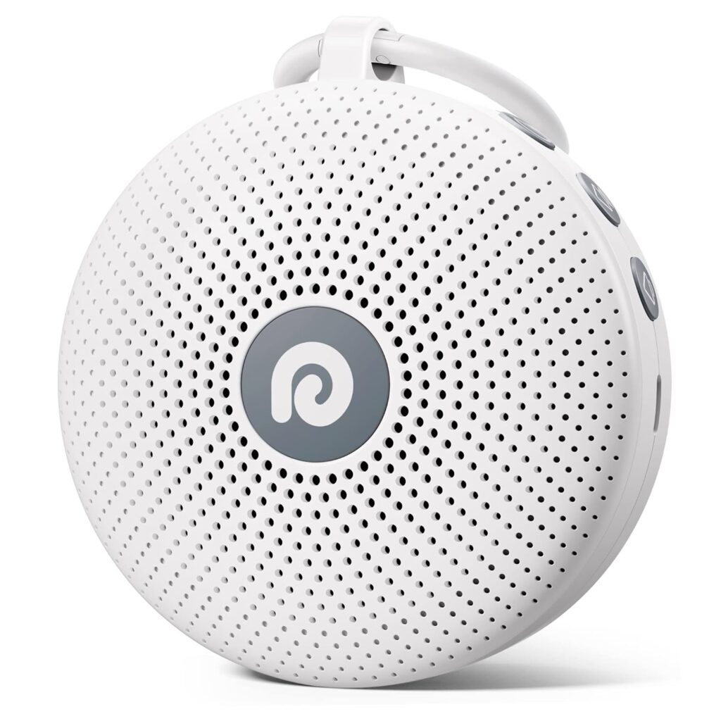A round, white portable Bluetooth speaker with a perforated front, a circular logo in the center, and a built-in carrying handle at the top. Three control buttons are visible on the side.