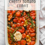 White baking dish filled with roasted cherry tomatoes, garlic, and herbs in olive oil. Text overlay reads “Easy Summer Recipe: Cherry Tomato Confit.” The perfect dish for cherry tomato confit lovers. “Off the Eaten Path” logo at the bottom.