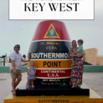 A family poses in front of the colorful Southernmost Point buoy in Key West, Florida, under cloudy skies. The text above them reads Family Vacation Activities in Key West, highlighting fun things to do in Key West with kids.